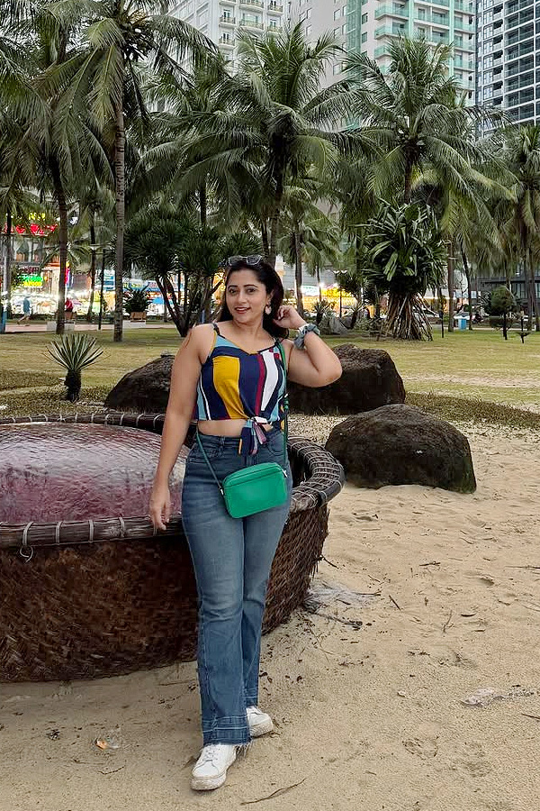 TV Actress Lahari At The beach with Her Son Photos10