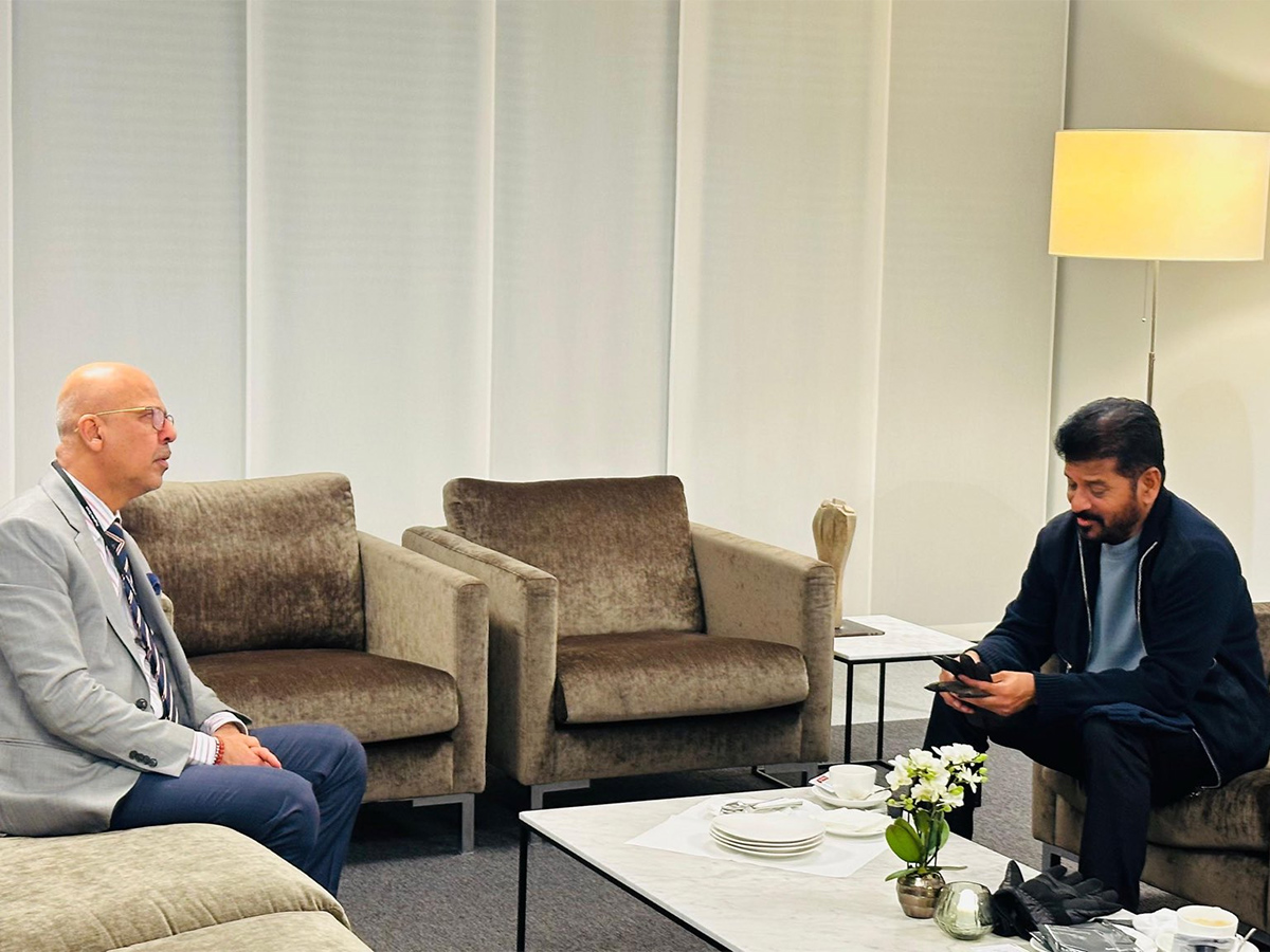 CM Revanth Reddy, Chiranjeevi In One Frame At Davos Meeting13