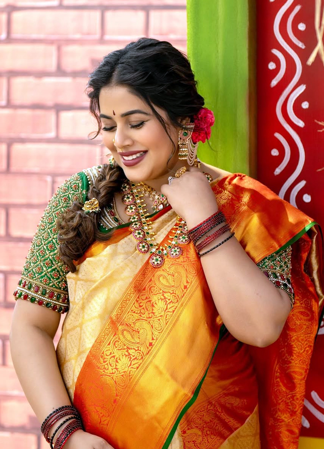 Poorna poses with her second pregnancy baby bump (Photos)15