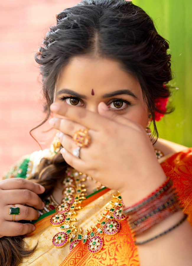 Poorna poses with her second pregnancy baby bump (Photos)16