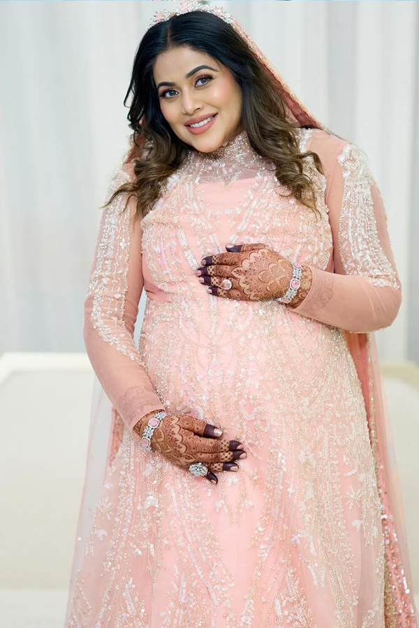 Actress Poorna Shares Baby Bump Photos With Husband11