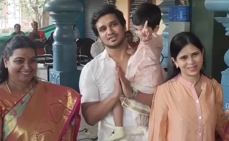 Actor Nikhil Siddharth Visited Palani Murugan Temple With His Son And Family Photos1