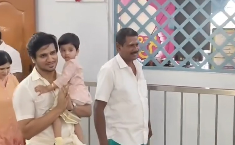 Actor Nikhil Siddharth Visited Palani Murugan Temple With His Son And Family Photos3