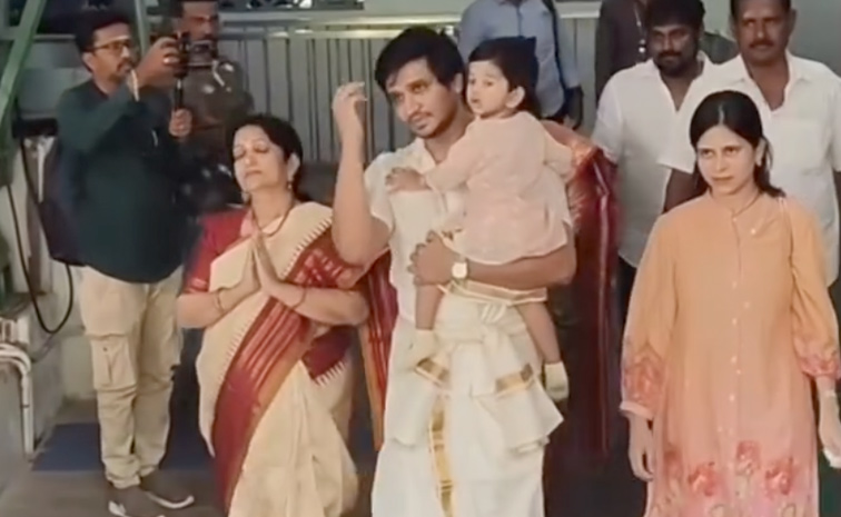 Actor Nikhil Siddharth Visited Palani Murugan Temple With His Son And Family Photos6
