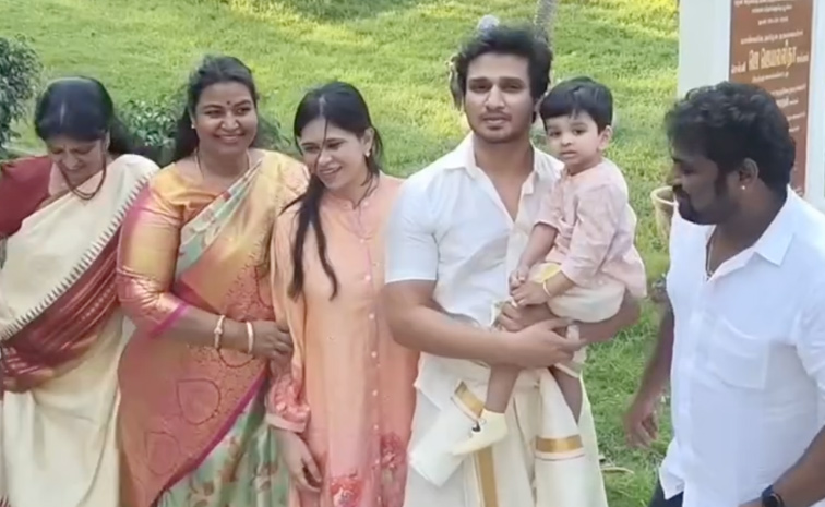 Actor Nikhil Siddharth Visited Palani Murugan Temple With His Son And Family Photos8