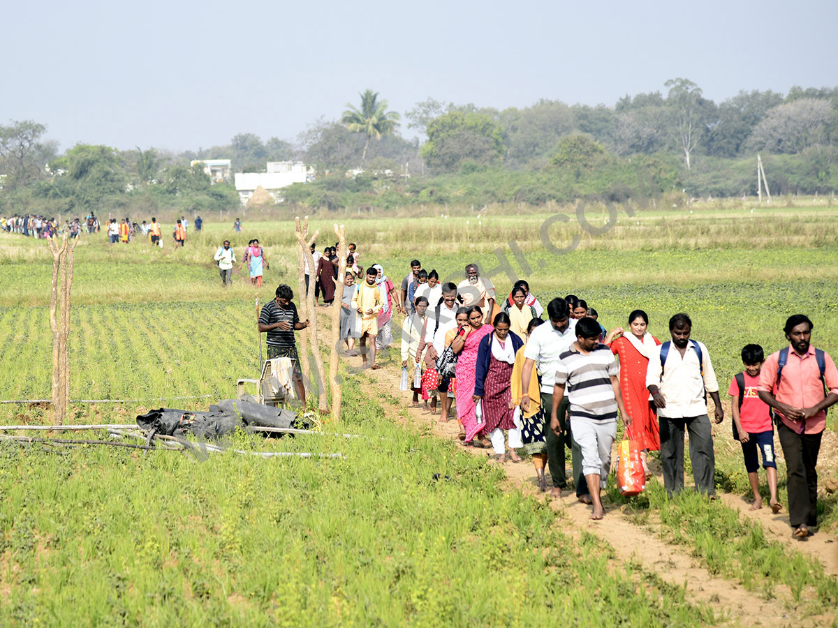 Devotees travel to the Srisailam temple by walk through forest area11