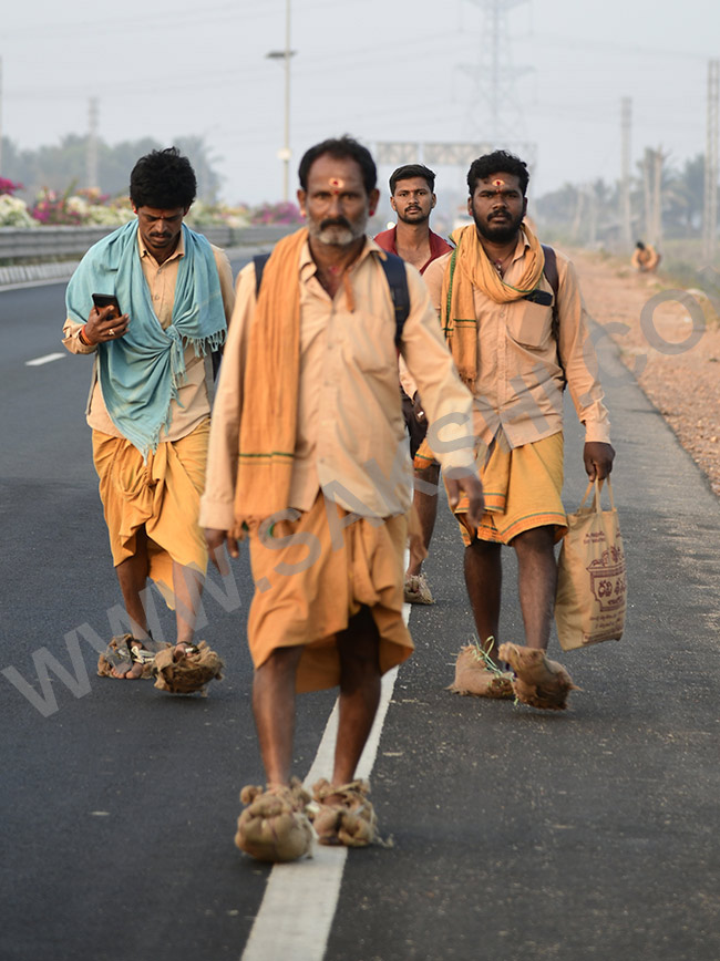 Devotees travel to the Srisailam temple by walk through forest area14