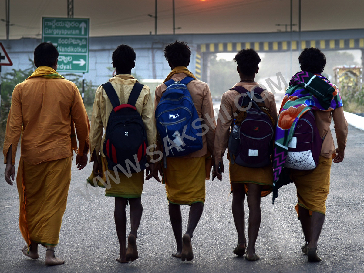 Devotees travel to the Srisailam temple by walk through forest area15