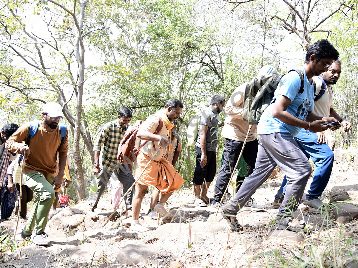 Devotees travel to the Srisailam temple by walk through forest area43