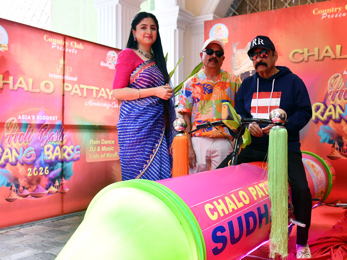 Actress Poonam Kaur Spray Gun Car In Hyderabad2