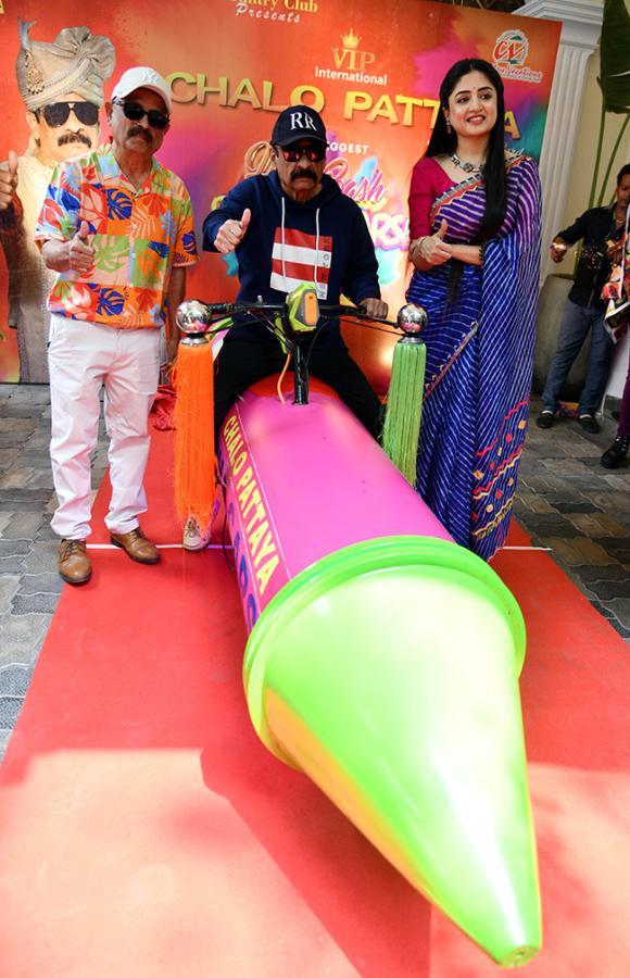 Actress Poonam Kaur Spray Gun Car In Hyderabad3