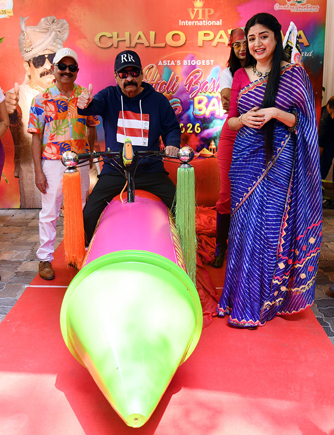 Actress Poonam Kaur Spray Gun Car In Hyderabad5