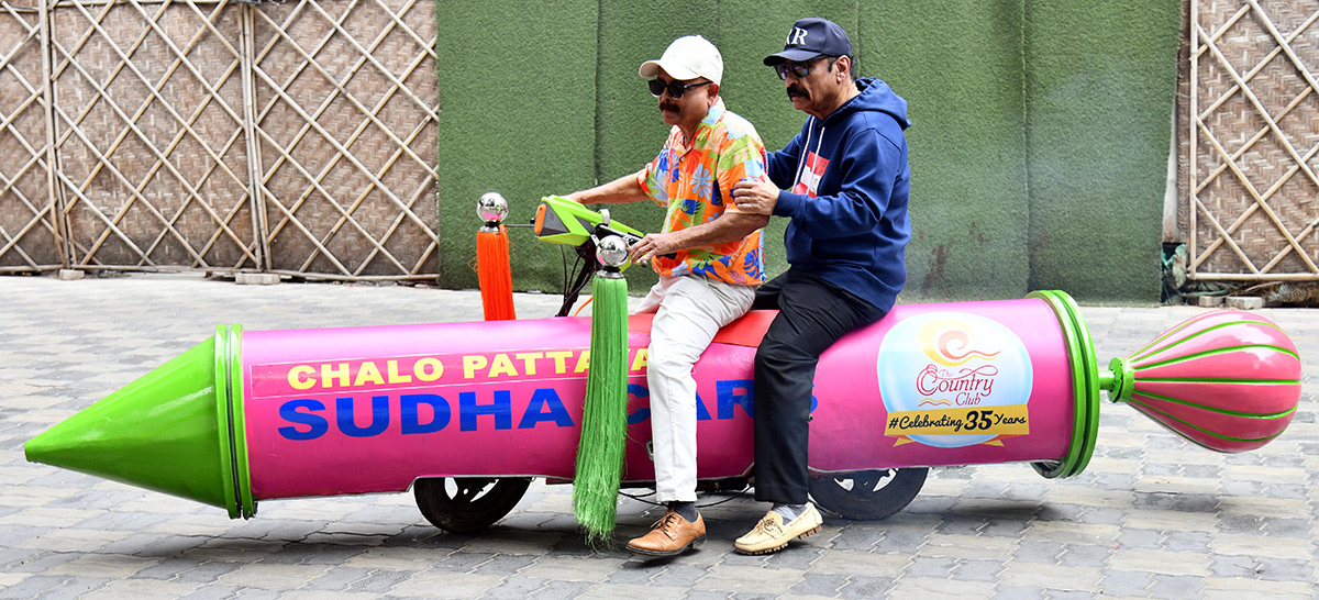Actress Poonam Kaur Spray Gun Car In Hyderabad9