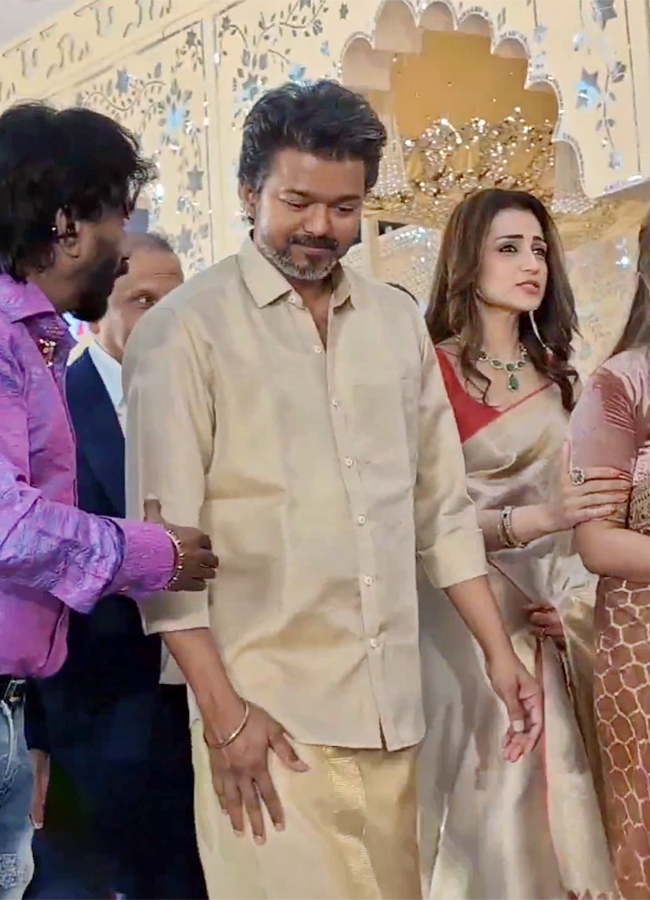 Actor and TVK chief Vijay attends wedding reception with Trisha16