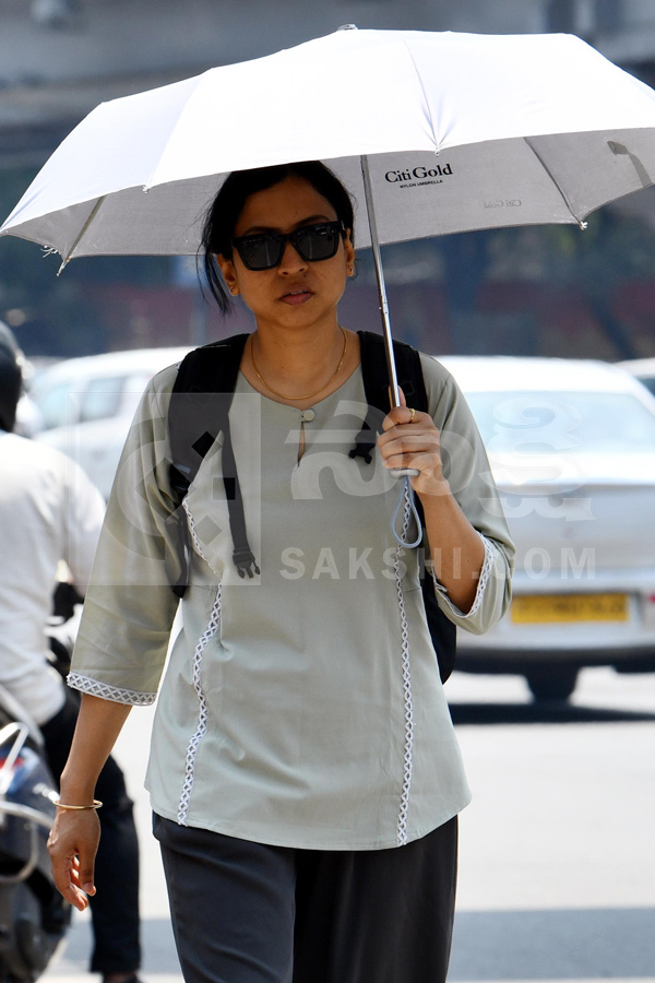 Public Struggling With Sun Heat Photos17