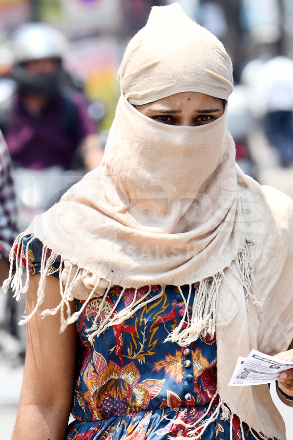 Public Struggling With Sun Heat Photos3