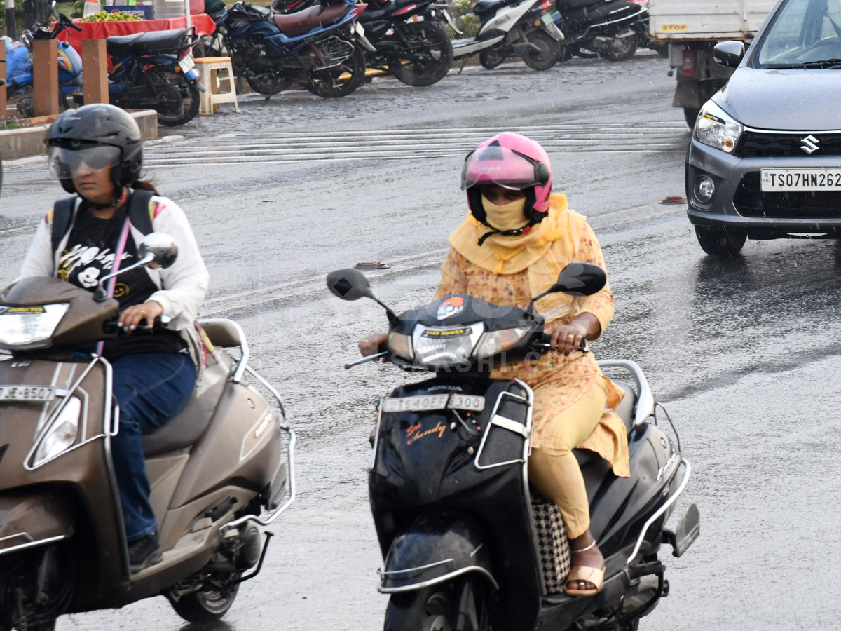 Rain Hits Several Places In Hyderabad Photos12