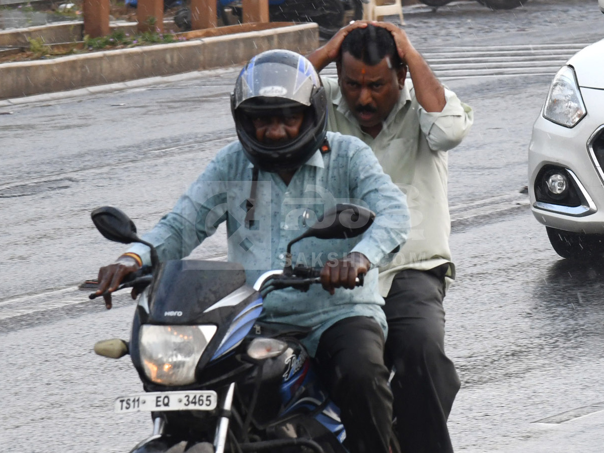 Rain Hits Several Places In Hyderabad Photos10