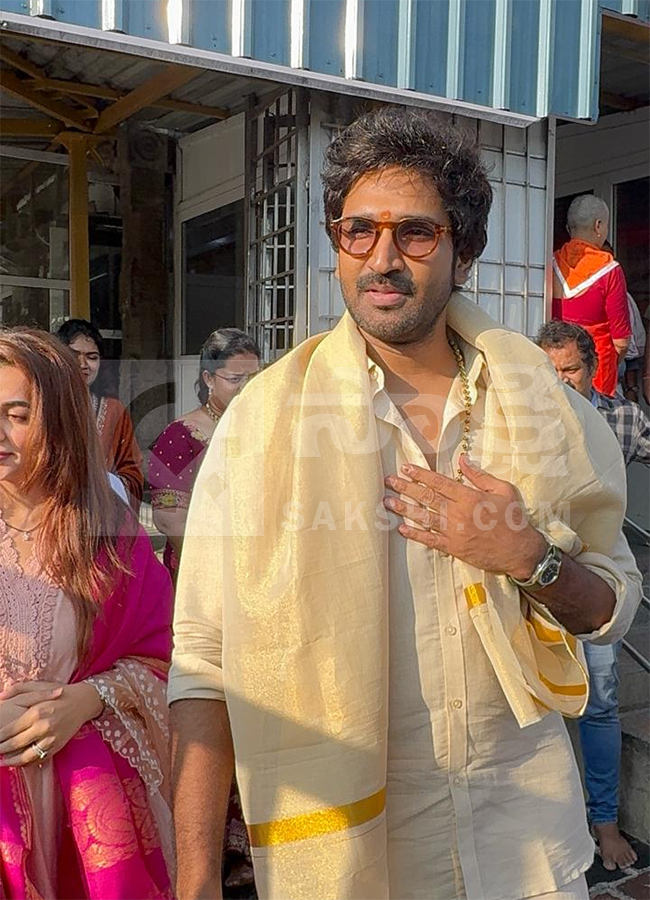 Actor Aadhi Pinisetty and his wife at Tirumala11