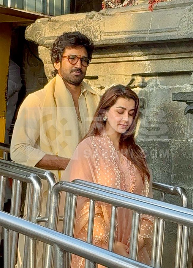 Actor Aadhi Pinisetty and his wife at Tirumala16
