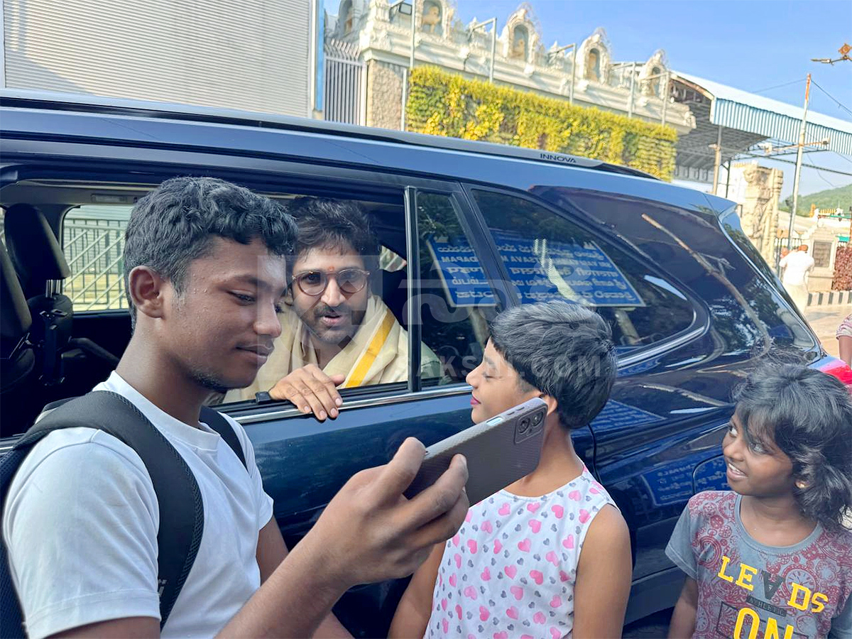 Actor Aadhi Pinisetty and his wife at Tirumala9