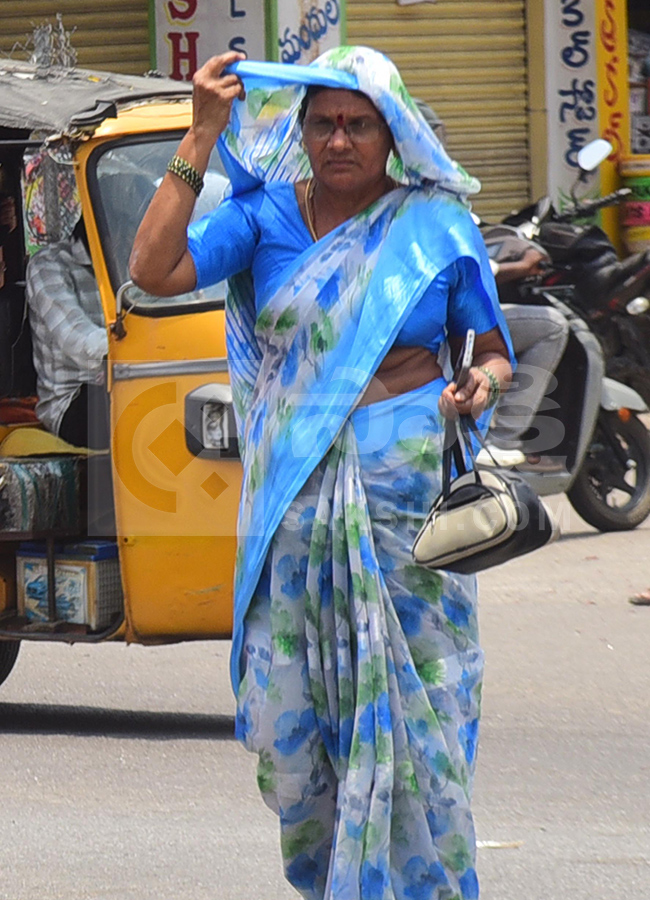 Heavy Summer Heat in Telugu States Photo Gallery11