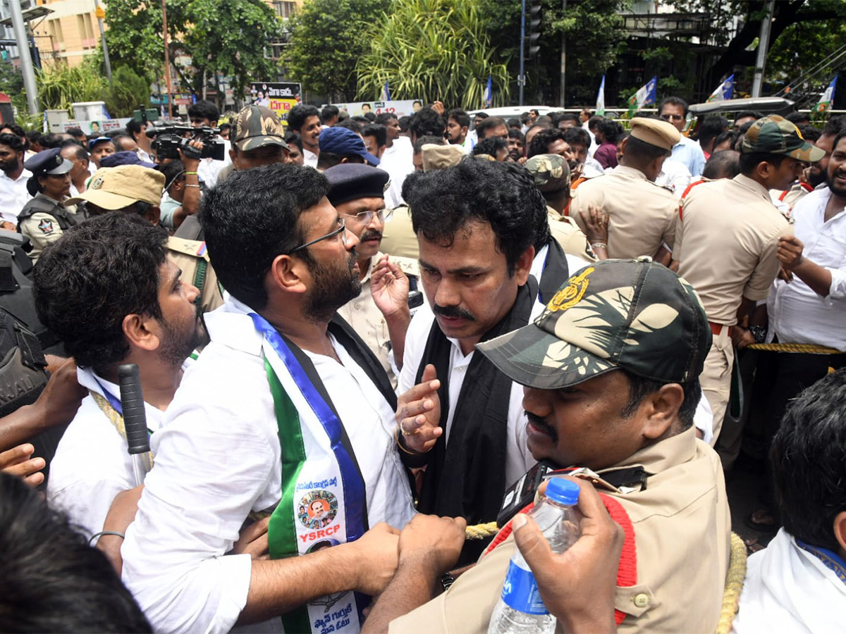  Huge rally under the auspices of YSRCP protesting irregularities in DSC Photos16