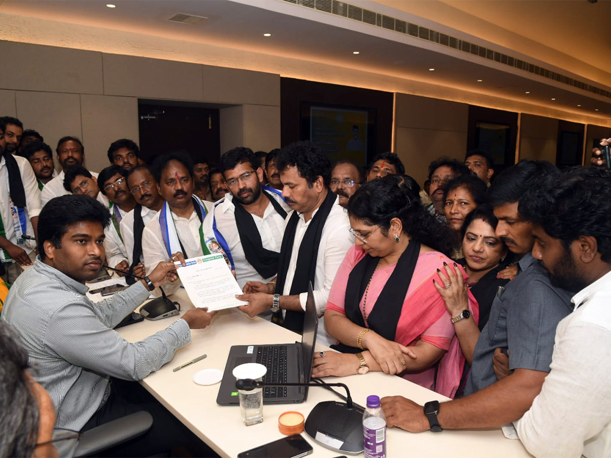  Huge rally under the auspices of YSRCP protesting irregularities in DSC Photos9