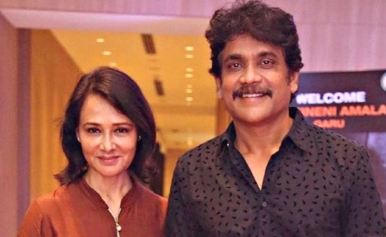 Nagarjuna And Amala akkineni 34th wedding Anniversary Photos11