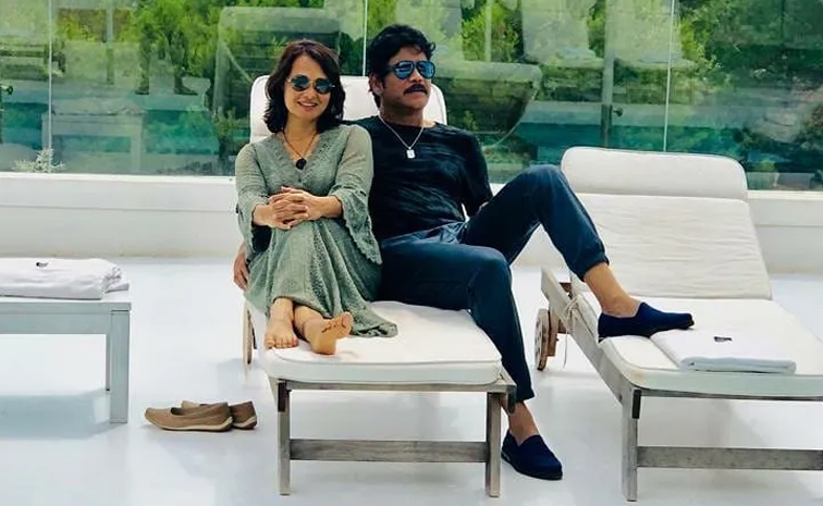 Nagarjuna And Amala akkineni 34th wedding Anniversary Photos17