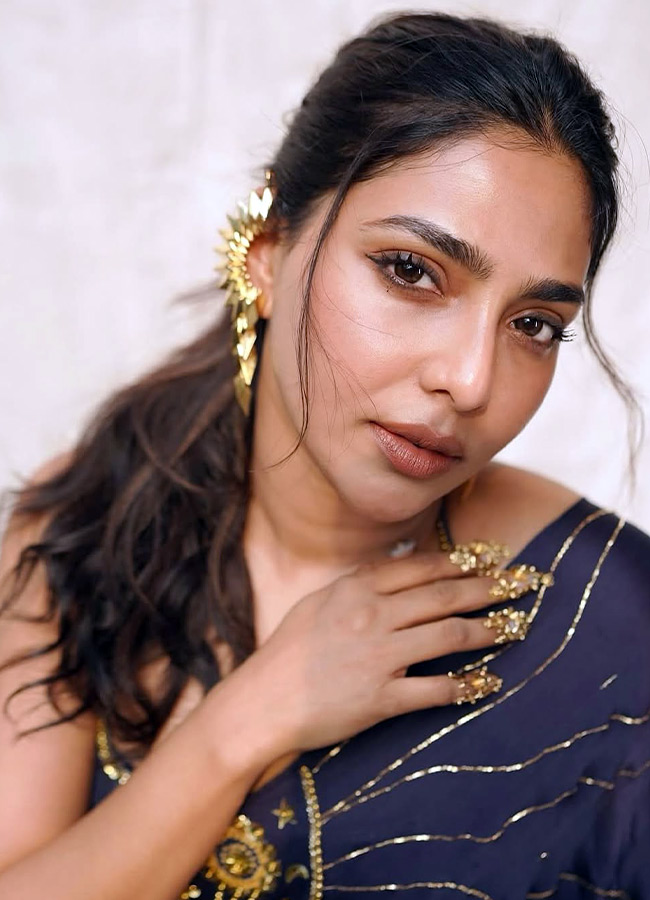 Malayalam Beauty Aishwarya Lekshmi Stuns in a Black Dress Stunning Photos2