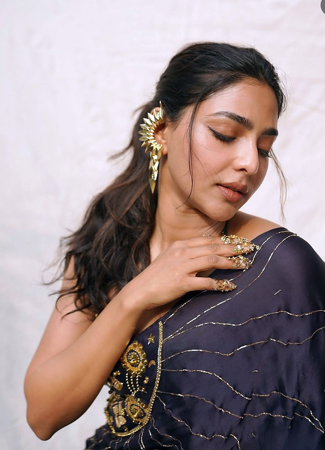 Malayalam Beauty Aishwarya Lekshmi Stuns in a Black Dress Stunning Photos6