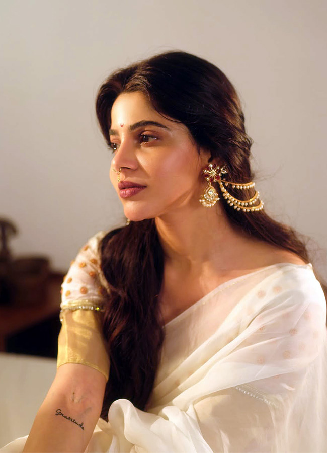 Divya Bharathi Shines In White Saree Photos10