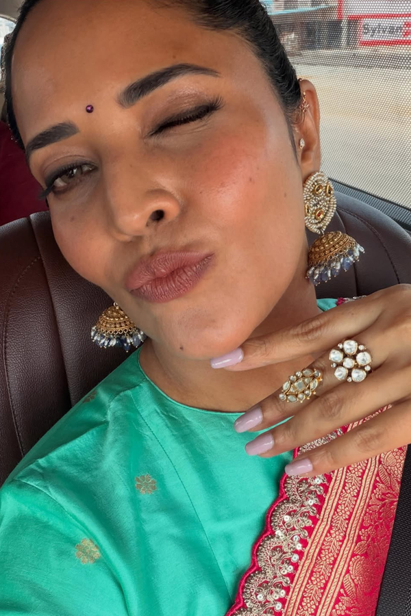 Simple superb stylish cute smile And beautiful saree looking By Actress And anchor Anasuya Photos14