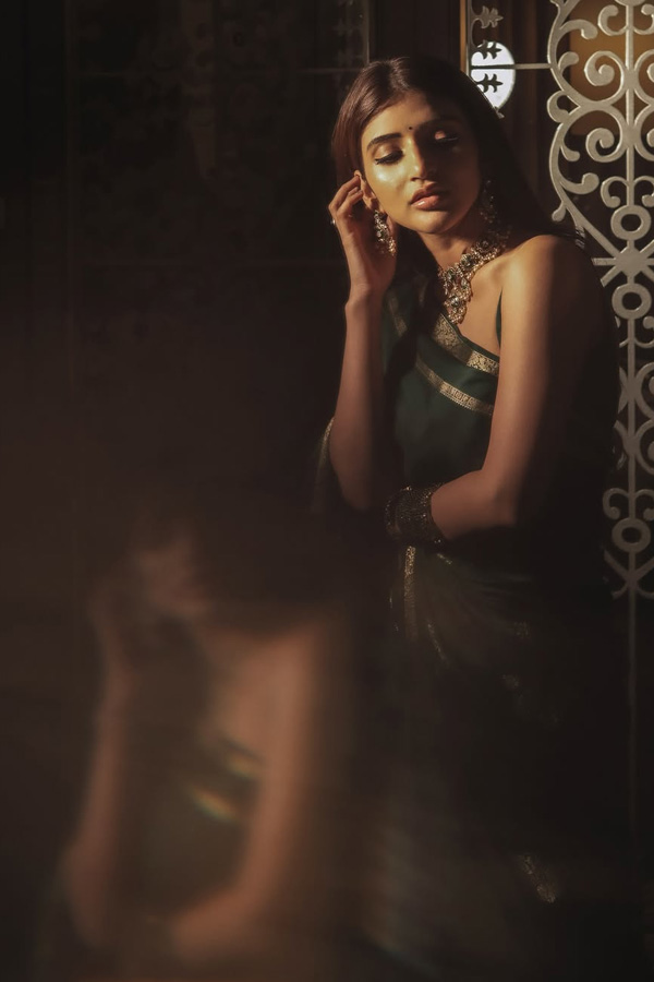 Actress Sreeleela Looks Absolutely Adorable In a Graceful Green Saree Photos6