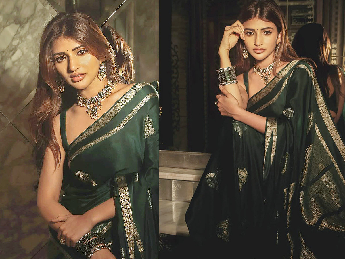 Actress Sreeleela Looks Absolutely Adorable In a Graceful Green Saree Photos1