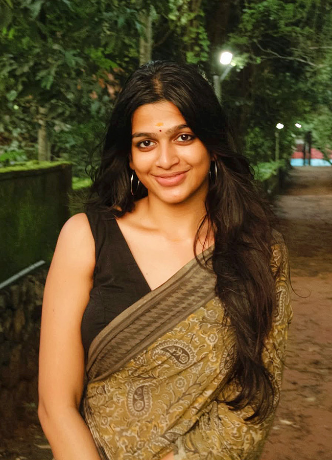 Malayalam Beauty Dazzles in a Black Saree Photos10