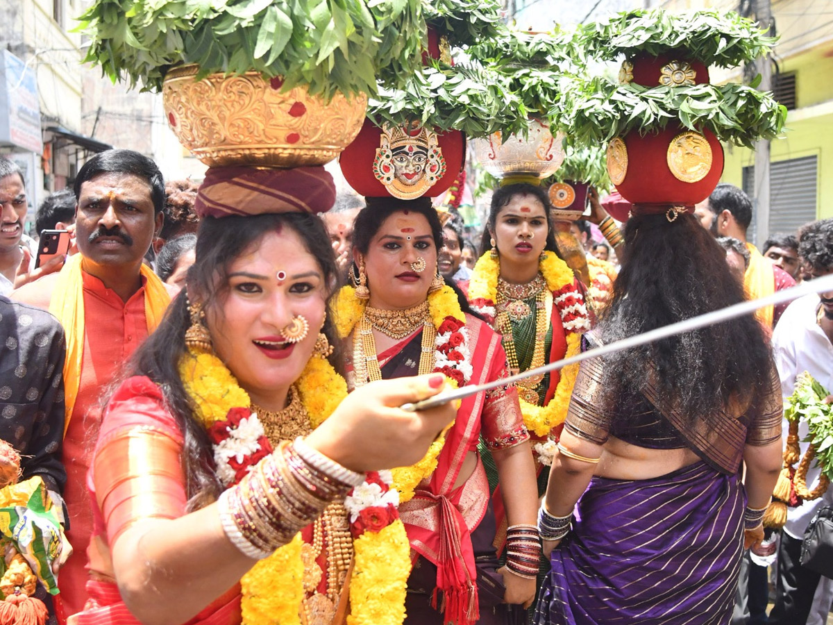 Devotees from Telangana offer Bonalu To Goddess Kanaka Durga In Vijayawada Photos11