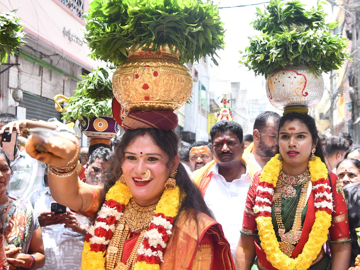 Devotees from Telangana offer Bonalu To Goddess Kanaka Durga In Vijayawada Photos14