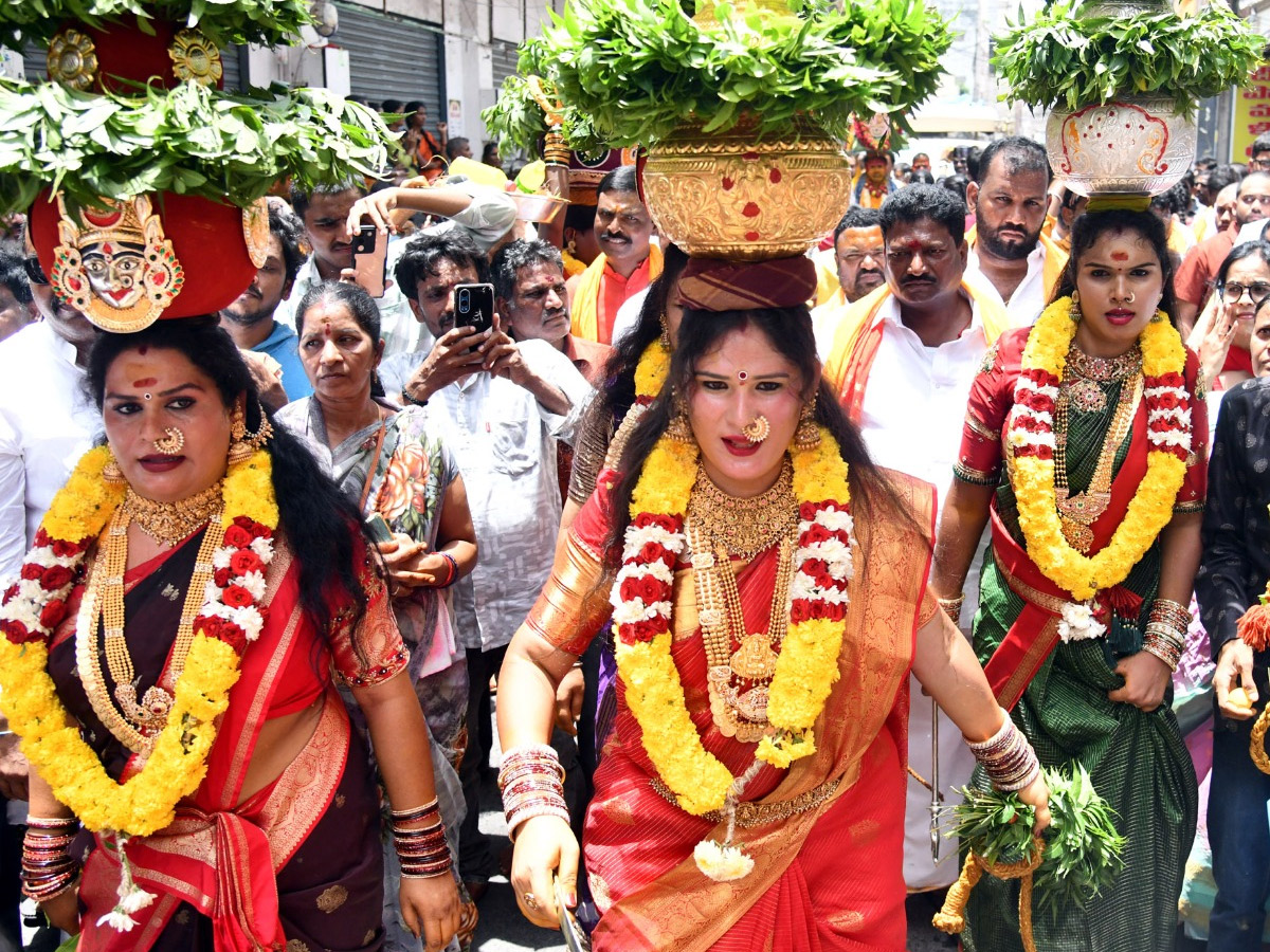 Devotees from Telangana offer Bonalu To Goddess Kanaka Durga In Vijayawada Photos15
