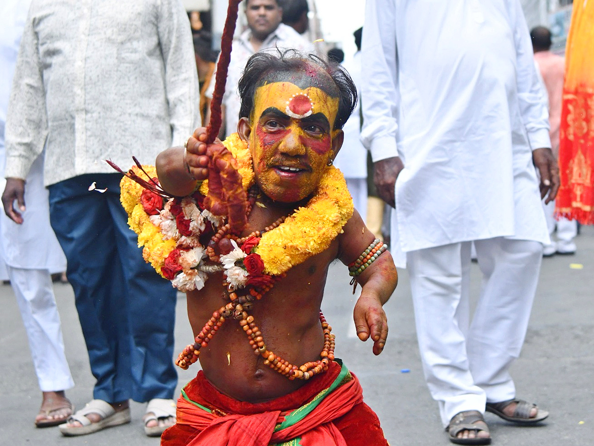 Devotees from Telangana offer Bonalu To Goddess Kanaka Durga In Vijayawada Photos16