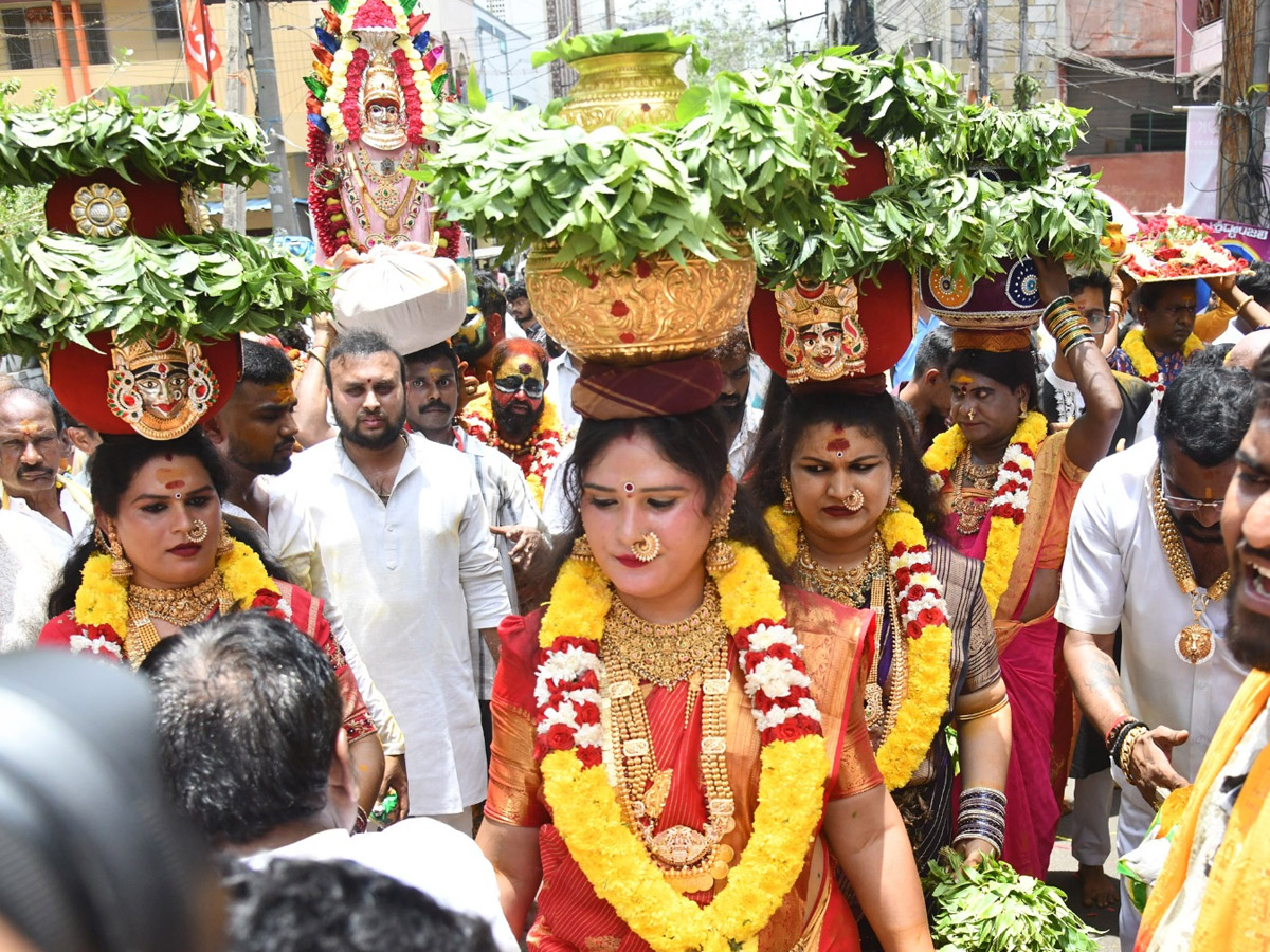 Devotees from Telangana offer Bonalu To Goddess Kanaka Durga In Vijayawada Photos3