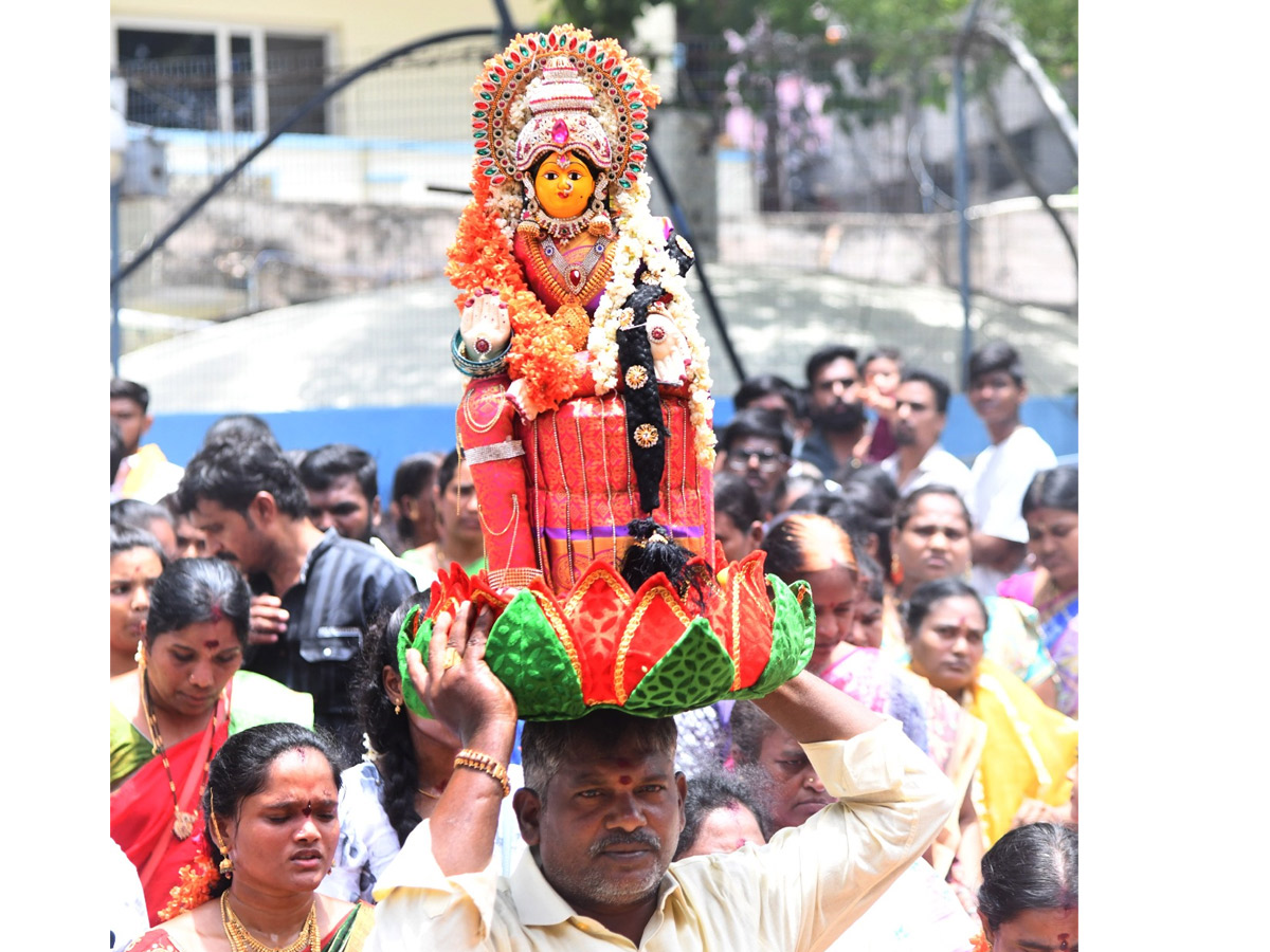 Devotees from Telangana offer Bonalu To Goddess Kanaka Durga In Vijayawada Photos23