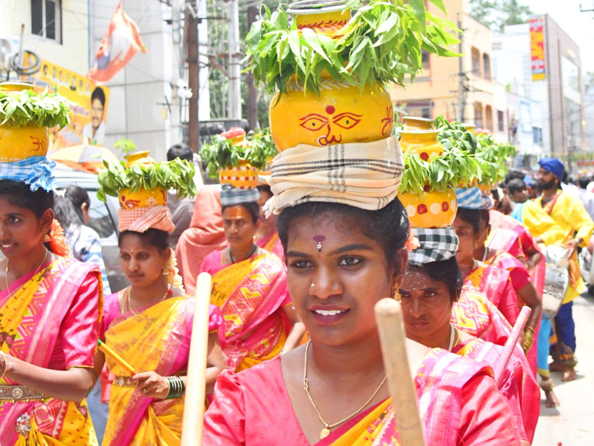 Devotees from Telangana offer Bonalu To Goddess Kanaka Durga In Vijayawada Photos25