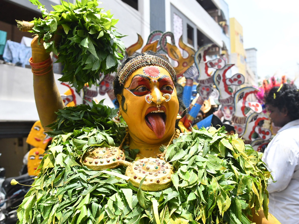 Devotees from Telangana offer Bonalu To Goddess Kanaka Durga In Vijayawada Photos26