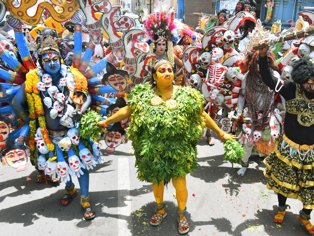Devotees from Telangana offer Bonalu To Goddess Kanaka Durga In Vijayawada Photos27