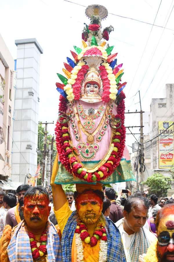 Devotees from Telangana offer Bonalu To Goddess Kanaka Durga In Vijayawada Photos5