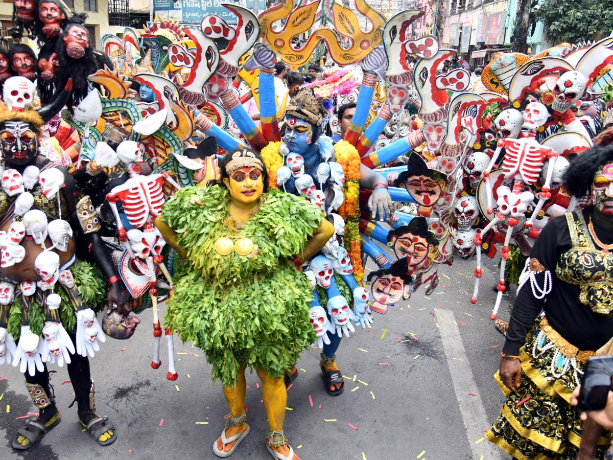 Devotees from Telangana offer Bonalu To Goddess Kanaka Durga In Vijayawada Photos8