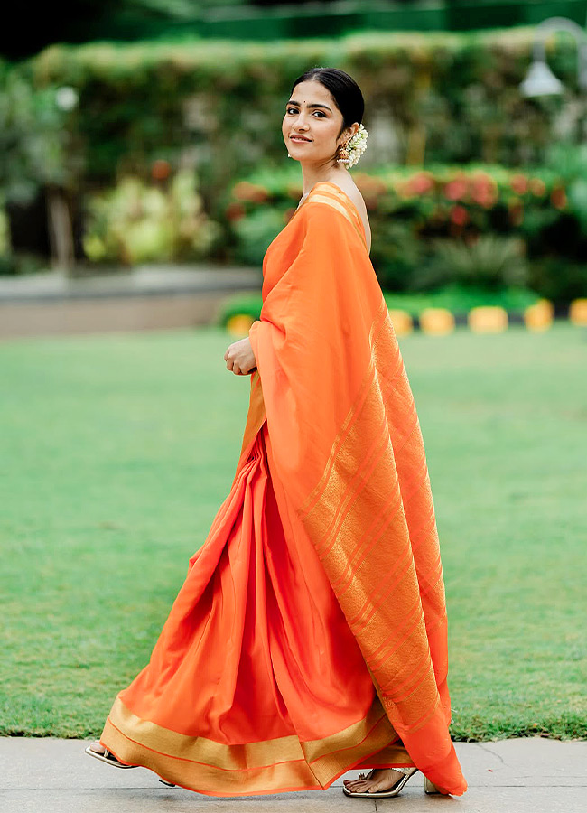 Rukmini Stuns in a Vaddanam and Jasmine Flowers Photos10