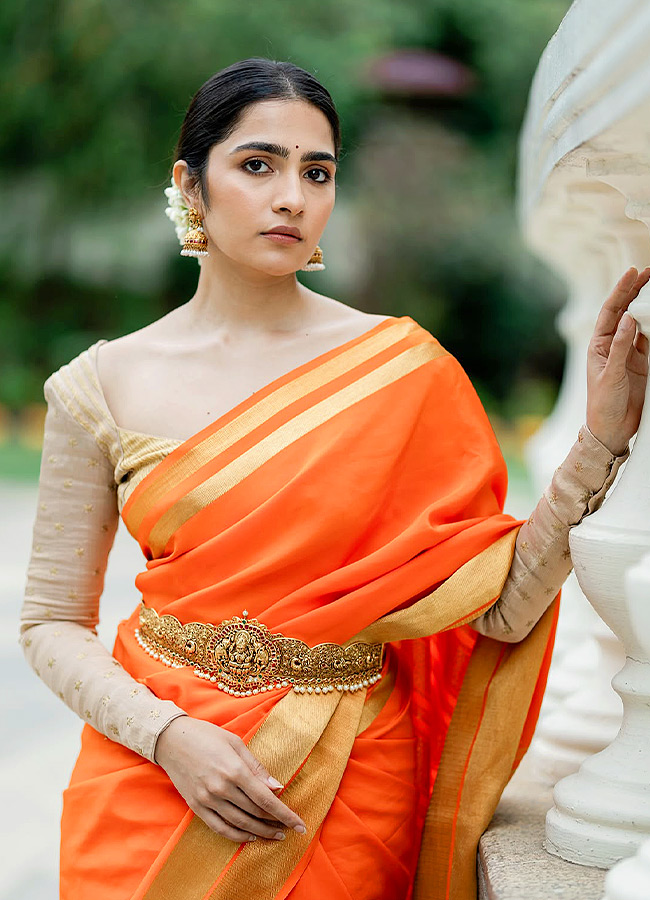 Rukmini Stuns in a Vaddanam and Jasmine Flowers Photos5